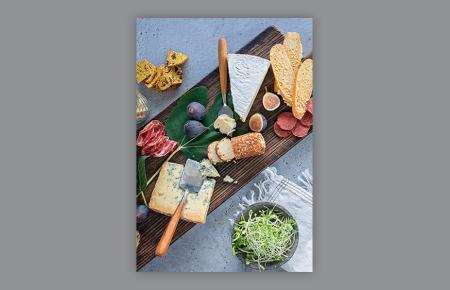 charcuterie board with cheese, meat and crackers 