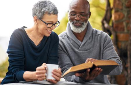 Couple reading a devotion together